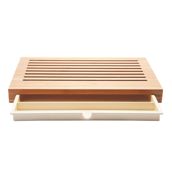 Sbriciola Brotschneidebrett von Alessi mit geöffneter Schublade