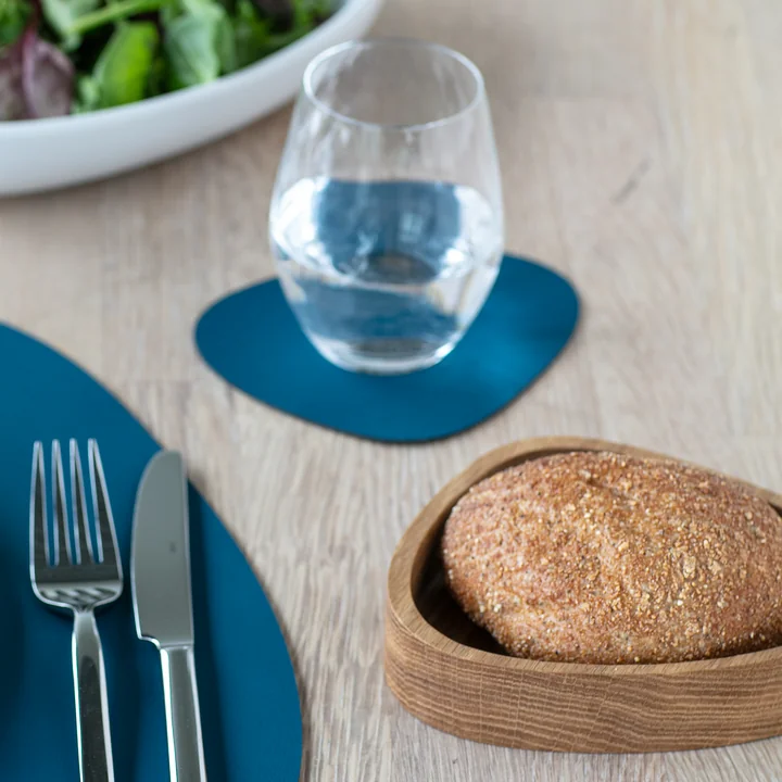 Glasuntersetzer Curve in Nupo petrol und Wood Box von Lind DNA