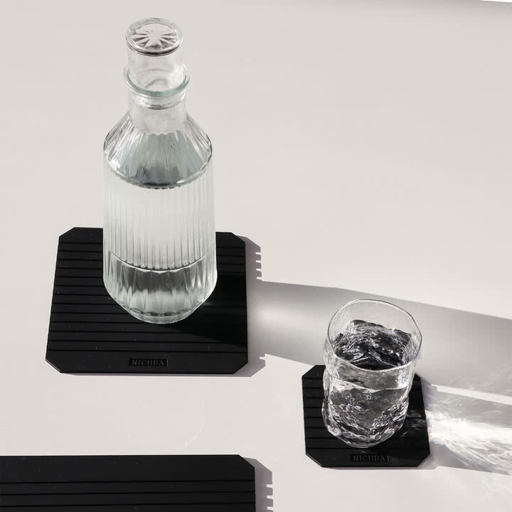 Nichba Design - Glasuntersetzer S und M, schwarz